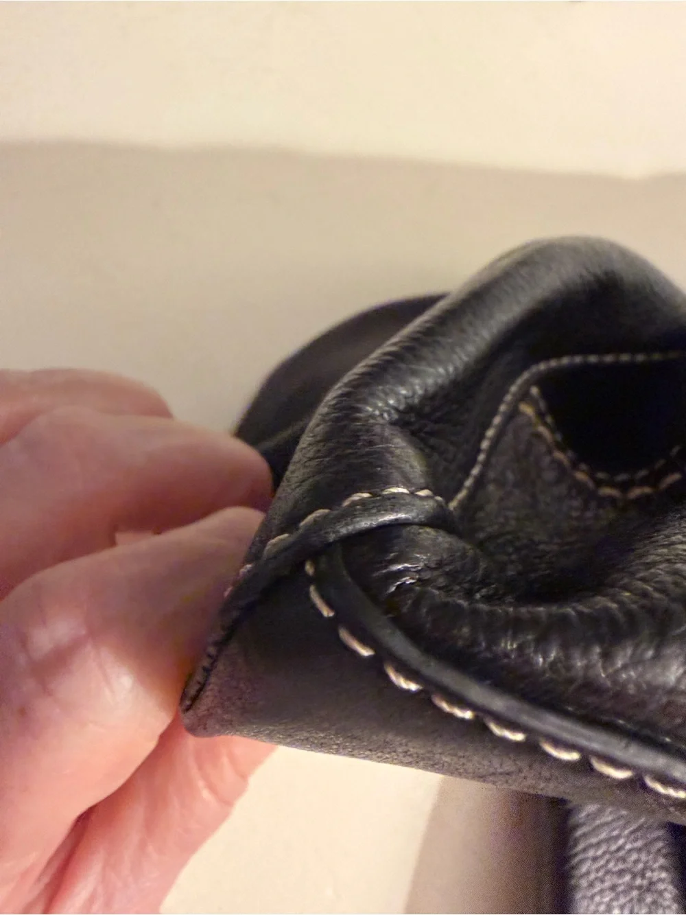The Sak “PO Asbury” large pebbled black leather hobo/shoulder bag.
